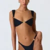 Bas de bikini échancré Volute orné, noir Bas de bikini échancré Volute orné, noir