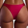Bas de bikini cheeky à larges bretelles Maui orné de perles, couleur rose framboise Bas de bikini cheeky à larges bretelles Maui orné de perles, couleur rose framboise