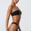 Bas de bikini cheeky à larges bretelles ornées de motifs Sunray, en noir Bas de bikini cheeky à larges bretelles ornées de motifs Sunray, en noir