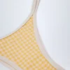 Bas de bikini Masia à double bretelle et coupe échancrée en vichy jaune Bas de bikini Masia à double bretelle et coupe échancrée en vichy jaune