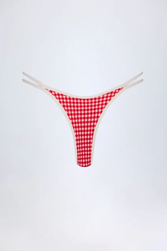 Bas de bikini Masia à double bretelle et coupe échancrée en vichy rouge Bas de bikini Masia à double bretelle et coupe échancrée en vichy rouge