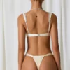 Bas de bikini string froncé Mahina en blanc perle Bas de bikini string froncé Mahina en blanc perle