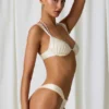Bas de bikini string froncé Mahina en blanc perle Bas de bikini string froncé Mahina en blanc perle