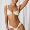 Bas de bikini string froncé Mahina en blanc perle Bas de bikini string froncé Mahina en blanc perle