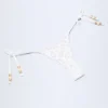 Bas de bikini string à nouer sur le côté Cebu avec perles, motif léopard blanc Bas de bikini string à nouer sur le côté Cebu avec perles, motif léopard blanc