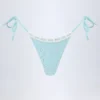 Bas de bikini string à nouer sur les côtés Vernazza en broderie anglaise, bleu poudré Bas de bikini string à nouer sur les côtés Vernazza en broderie anglaise, bleu poudré