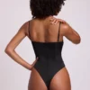 Body corset en satin à encolure plongeante et laçage Yelda, noir Body corset en satin à encolure plongeante et laçage Yelda, noir