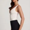 Body Zayla en dentelle transparente à encolure plongeante festonnée, blanc Body Zayla en dentelle transparente à encolure plongeante festonnée, blanc