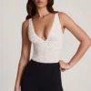 Body Zayla en dentelle transparente à encolure plongeante festonnée, blanc Body Zayla en dentelle transparente à encolure plongeante festonnée, blanc