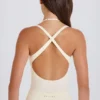 Bodys à dos croisé superposés en jersey de coton stretch, couleur crème Bodys à dos croisé superposés en jersey de coton stretch, couleur crème