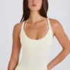 Bodys à dos croisé superposés en jersey de coton stretch, couleur crème Bodys à dos croisé superposés en jersey de coton stretch, couleur crème