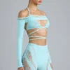 Boléro court Pixie orné de motifs, bleu glacier Boléro court Pixie orné de motifs, bleu glacier
