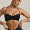 Brassière dos nu en jersey fluide avec détails métalliques Jerika, en noir Brassière dos nu en jersey fluide avec détails métalliques Jerika, en noir