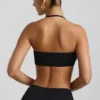Brassière dos nu en jersey fluide avec détails métalliques Jerika, en noir Brassière dos nu en jersey fluide avec détails métalliques Jerika, en noir