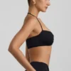 Brassière dos nu en jersey fluide avec détails métalliques Jerika, en noir Brassière dos nu en jersey fluide avec détails métalliques Jerika, en noir