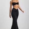 Brassière dos nu en jersey fluide avec détails métalliques Jerika, en noir Brassière dos nu en jersey fluide avec détails métalliques Jerika, en noir