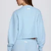 Cardigan court en maille bleu poudré Cardigan court en maille bleu poudré