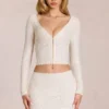 Cardigan plongeant en dentelle Odelia, couleur ivoire Cardigan plongeant en dentelle Odelia, couleur ivoire