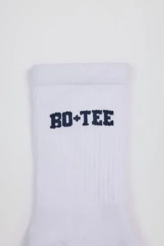 Chaussettes mi-mollet côtelées en blanc