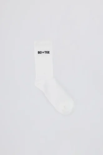 Chaussettes mi-mollet côtelées en blanc Chaussettes mi-mollet côtelées en blanc