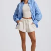 Chemise oversize en popeline de coton à rayures bleues Chemise oversize en popeline de coton à rayures bleues