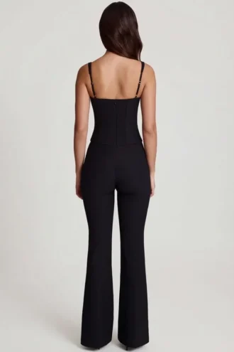 Combinaison Elanie à encolure dégagée et jambes évasées, couleur noir