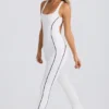 Combinaison Petite Soft Active à dos nu, couleur blanche Combinaison Petite Soft Active à dos nu, couleur blanche