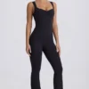 Combinaison Soft Active à découpes dans le dos, couleur noir Combinaison Soft Active à découpes dans le dos, couleur noir