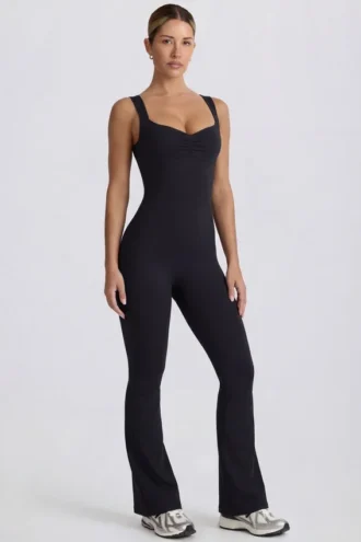 Combinaison Soft Active à découpes dans le dos, couleur noir