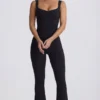 Combinaison Soft Active à découpes dans le dos, couleur noir Combinaison Soft Active à découpes dans le dos, couleur noir