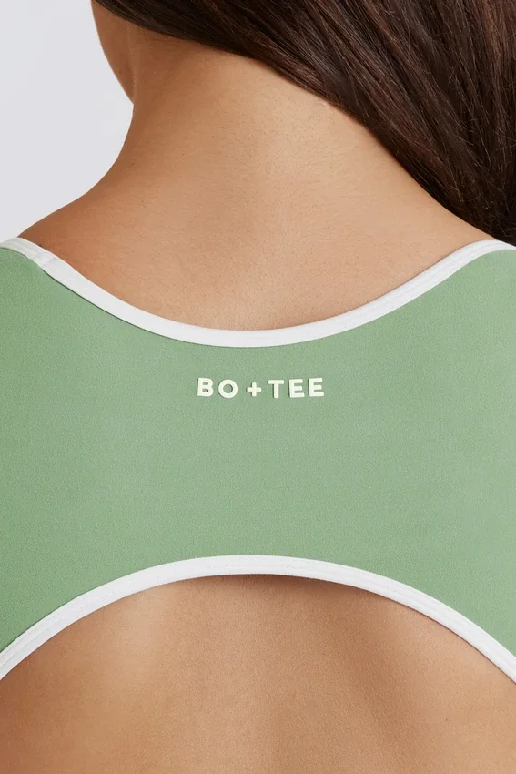 Combinaison Soft Active à dos nu, couleur verte Combinaison Soft Active à dos nu, couleur verte