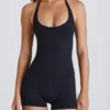 Combinaison Soft Active à dos nu en noir Combinaison Soft Active à dos nu en noir