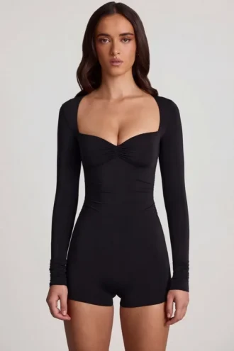 Combishort courte à manches longues en jersey doux Vionne, décolleté en cœur, couleur noire