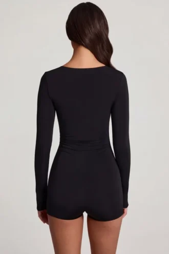 Combishort courte à manches longues en jersey doux Vionne, décolleté en cœur, couleur noire