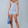 Combishort Lalita à col dos nu et boutons en denim clair Combishort Lalita à col dos nu et boutons en denim clair