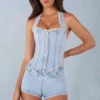 Combishort Lalita à col dos nu et boutons en denim clair Combishort Lalita à col dos nu et boutons en denim clair