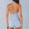Combishort Lalita à col dos nu et boutons en denim clair Combishort Lalita à col dos nu et boutons en denim clair
