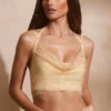 Corset à col bénitier orné Selena en doré Corset à col bénitier orné Selena en doré