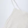 Crop top caraco froncé Livia Pointelle en blanc Crop top caraco froncé Livia Pointelle en blanc