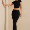 Crop top à manches courtes Myaree en noir Crop top à manches courtes Myaree en noir