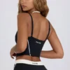 Débardeur court superposé Soft Active en noir Débardeur court superposé Soft Active en noir