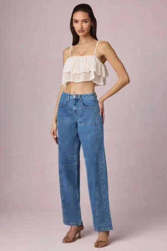 Jean Bobbi à taille mi-haute et jambes évasées, délavage bleu moyen