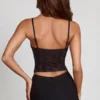 Haut à col bénitier et découpe transparente Armelia en noir Haut à col bénitier et découpe transparente Armelia en noir