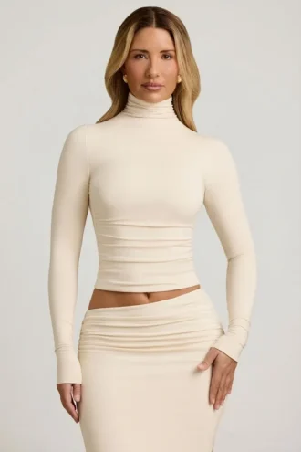 Haut à col roulé dos nu froncé Auri en modal, couleur ivoire
