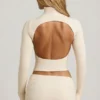 Haut à col roulé dos nu froncé Auri en modal, couleur ivoire Haut à col roulé dos nu froncé Auri en modal, couleur ivoire