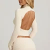 Haut à col roulé dos nu froncé Auri en modal, couleur ivoire Haut à col roulé dos nu froncé Auri en modal, couleur ivoire