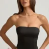 Haut corset Audrina à découpes et nœud, noir Haut corset Audrina à découpes et nœud, noir