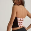 Haut corset Audrina à découpes et nœud, noir Haut corset Audrina à découpes et nœud, noir