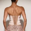 Haut corset drapé en satin et dentelle Yulea, couleur or Haut corset drapé en satin et dentelle Yulea, couleur or