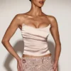 Haut corset drapé en satin et dentelle Yulea, couleur or Haut corset drapé en satin et dentelle Yulea, couleur or